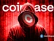 Figura encapuzada em ambiente digital vermelho segurando logo da Coinbase, representando o ataque cibernético à exchange.